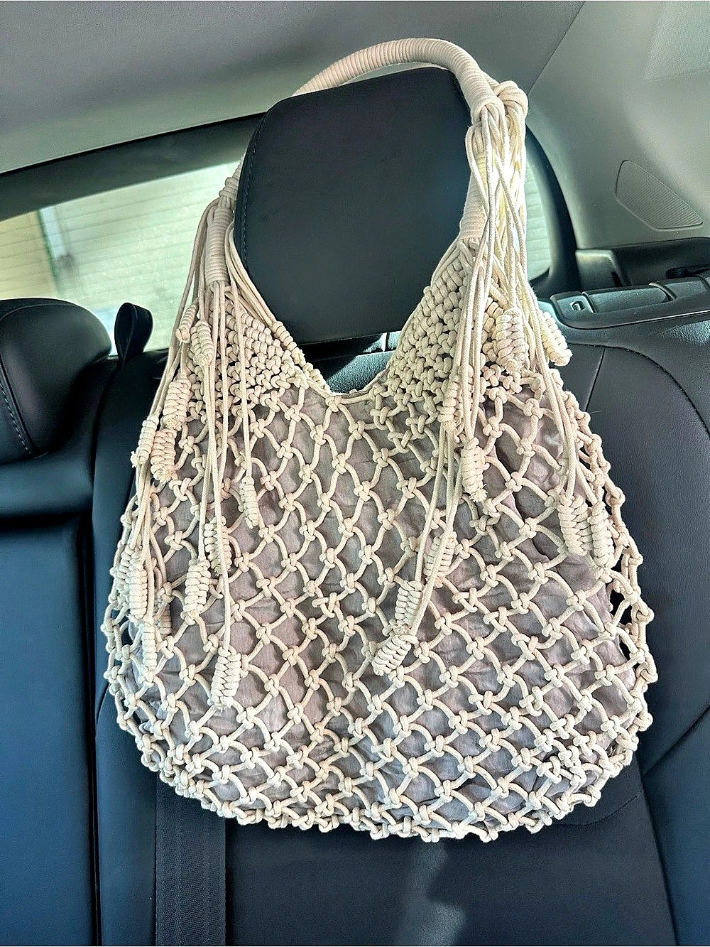 Monserat De Lucca handcrafted knotted bag with a boho-chic design.